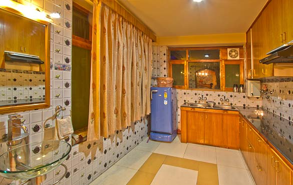 Self-contained modular kitchen where you can cook or a cook on request at a nominal cost. setan